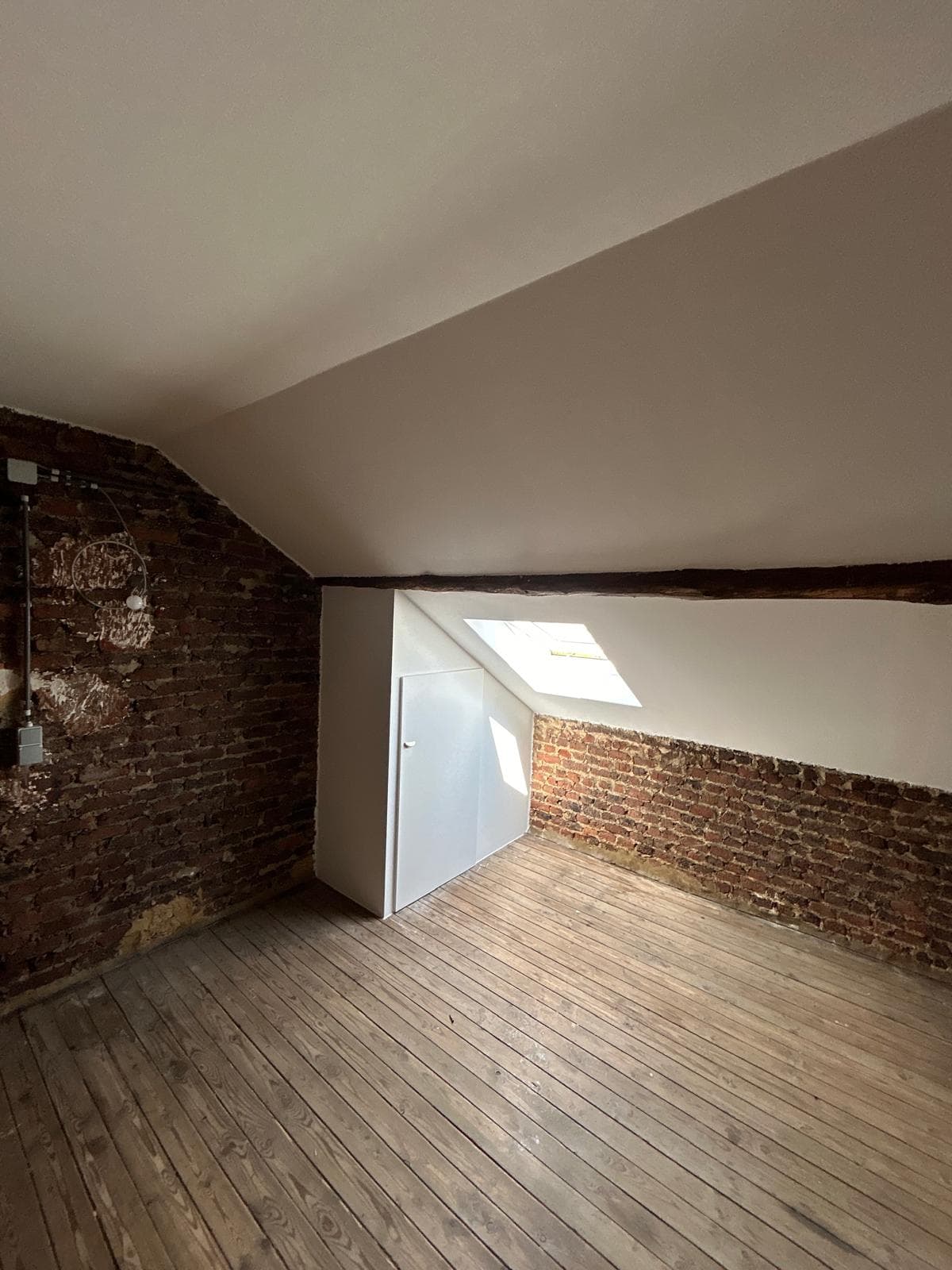 Combles avec velux et mur bas